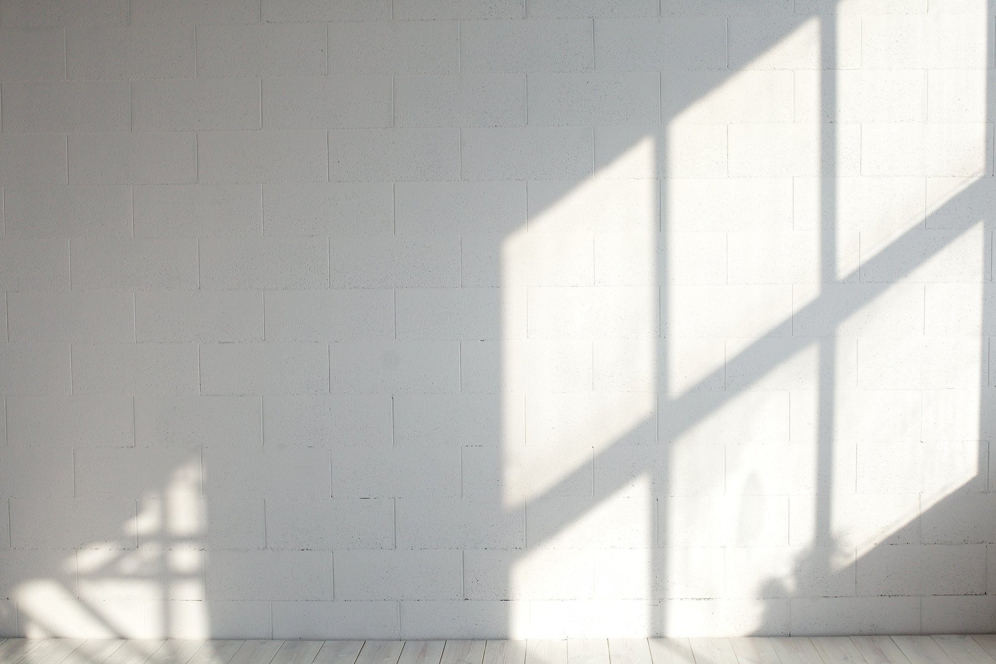 White empty loft interior with window shadow